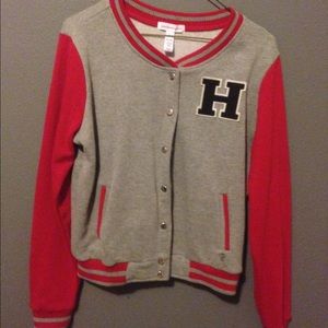gray and red varsity jacket