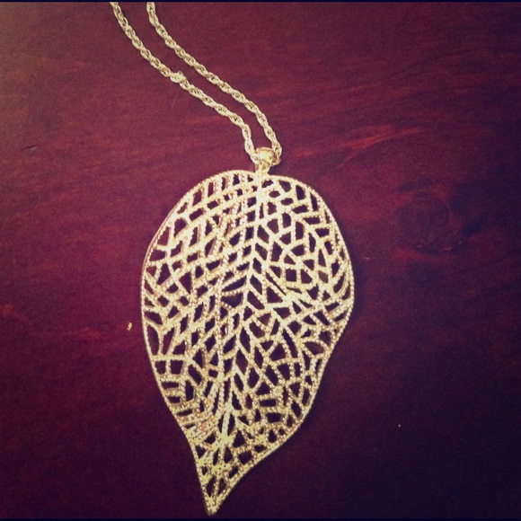 Large, ornate leaf necklace.