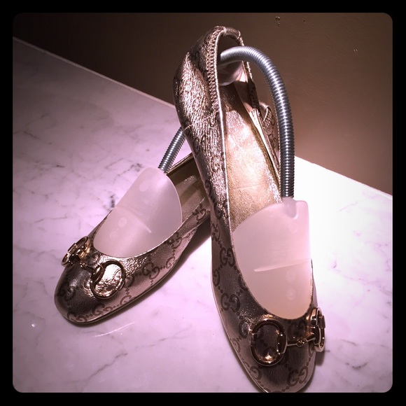 100% Authentic embossed Gucci flats in silver