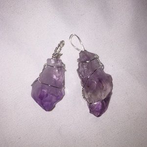 Two purple crystal pendants.