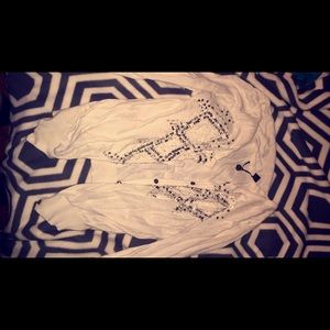 sparkly white buckle cardigan.