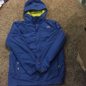 Blue north face wind breaker