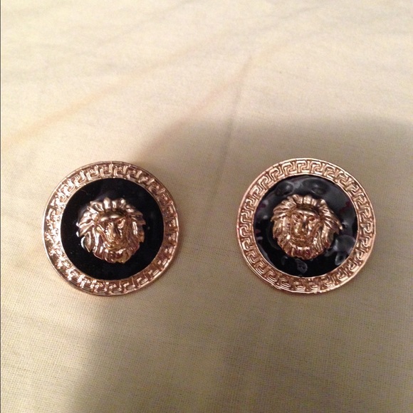 Lions head earrings brand new!! Plastic backs!