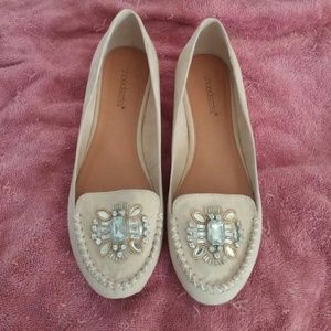 Tan embellished flats