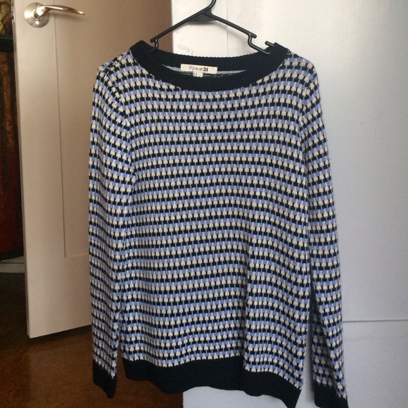 Cozy patterned blue, black, and white sweater!