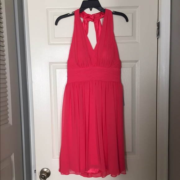 Red dress-tag says 4 but this dress fits like a 6.
