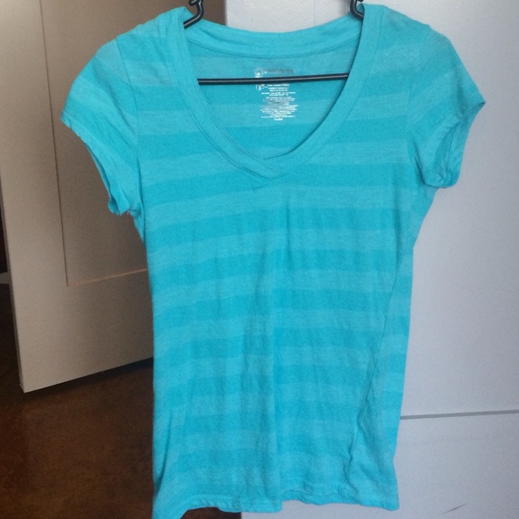 Beautiful blue v-neck t-shirt with stripes.