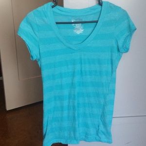 Beautiful blue v-neck t-shirt with stripes.
