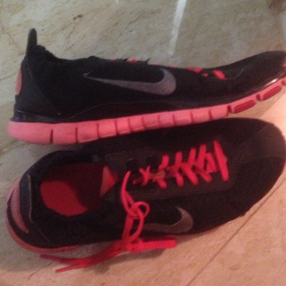 Hot pink Nike running shoes