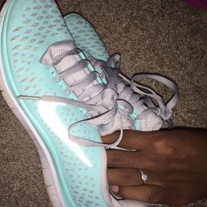 Mint colored Nike free runs