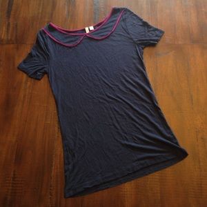 Navy blue top with purple Peter Pan collar