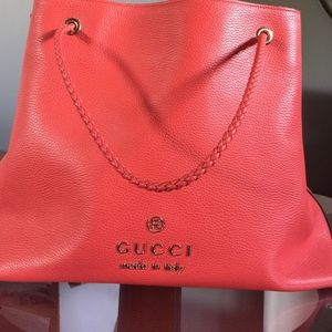 Gucci leather orange tote.