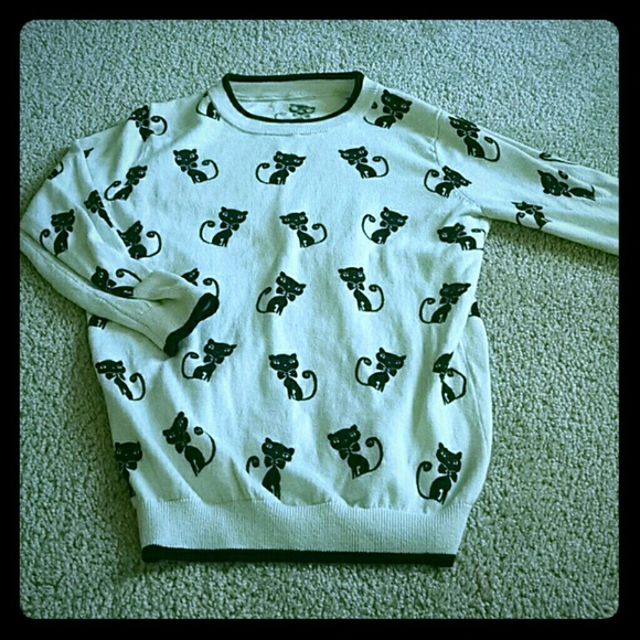 White/cream sweater, with cats