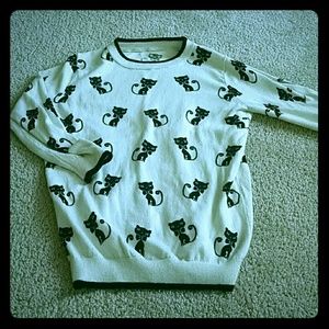 White/cream sweater, with cats