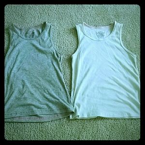 Gray and white tanks