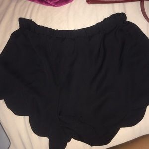 Black scalloped shorts