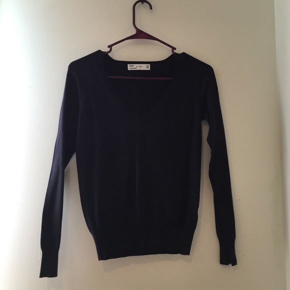 Navy v-neck Zara sweater.