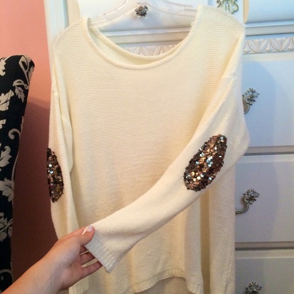 very cute white sweater with sparkled elbows