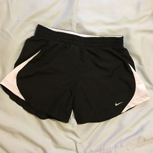 Black and white Nike running shorts