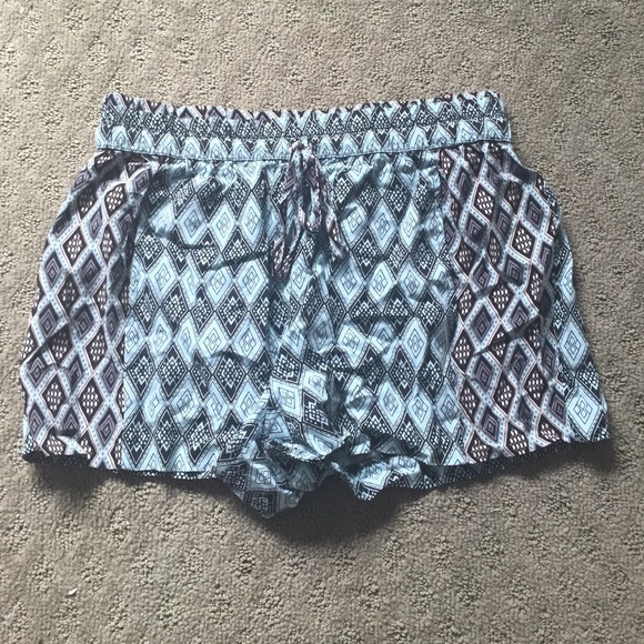 Blue/tan/black patterned shorts