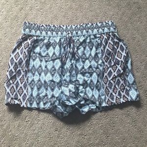 Blue/tan/black patterned shorts