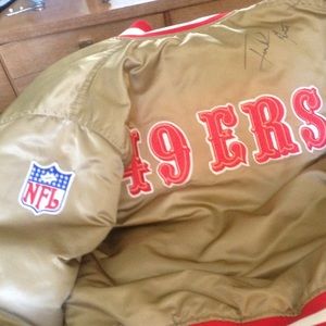 1980s starter jacket signed by Frank Gore