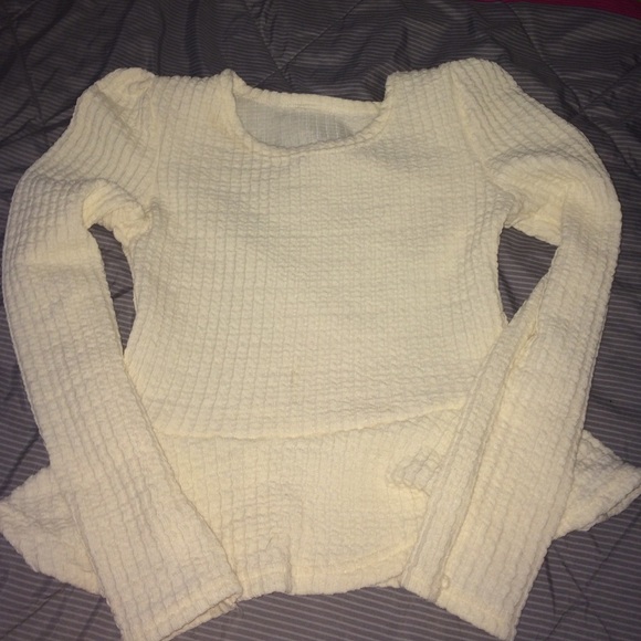 Forever 21 peplum cream colored top.