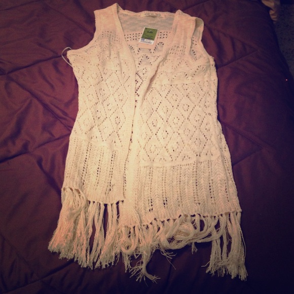 Sleeveless sweater vest thing. NWT.