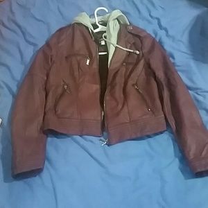 Wine colored moto jacket with grey hood attached.