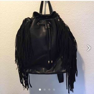 Black vegan leather backpack.. Comes with dust bag