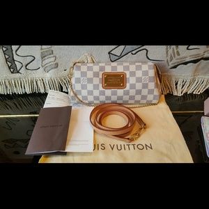 $610 Authentic LV Eva Clutch