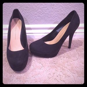Black suede pumps