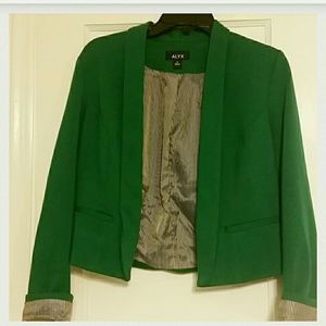 Green blazer with pinstriped inside.