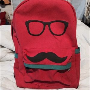 Glasses and mustache backpack