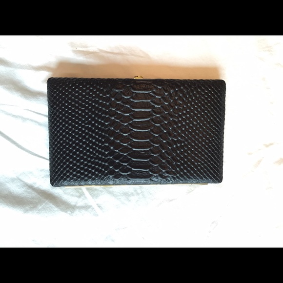 Abas black full framed clutch