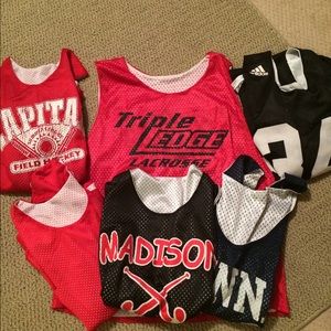 Six lacrosse and field hockey jerseys. Great deal