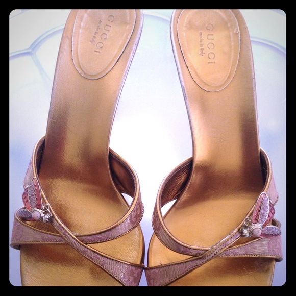 pink and gold gucci slides