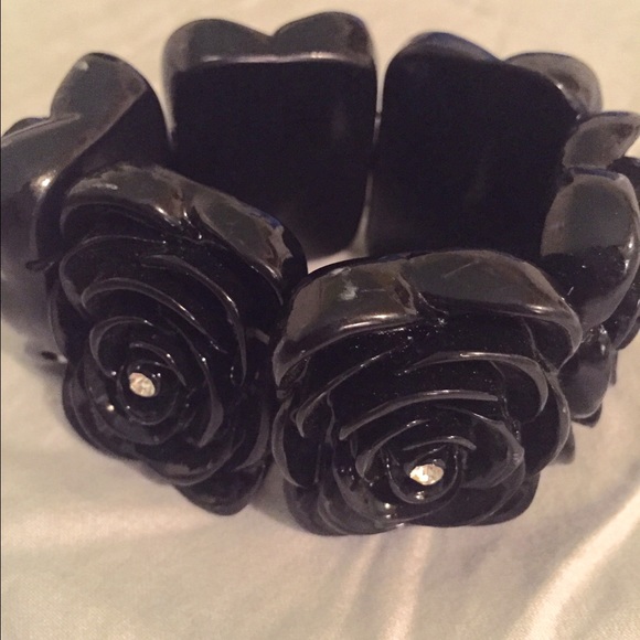 Black rose cuff, never worn!!