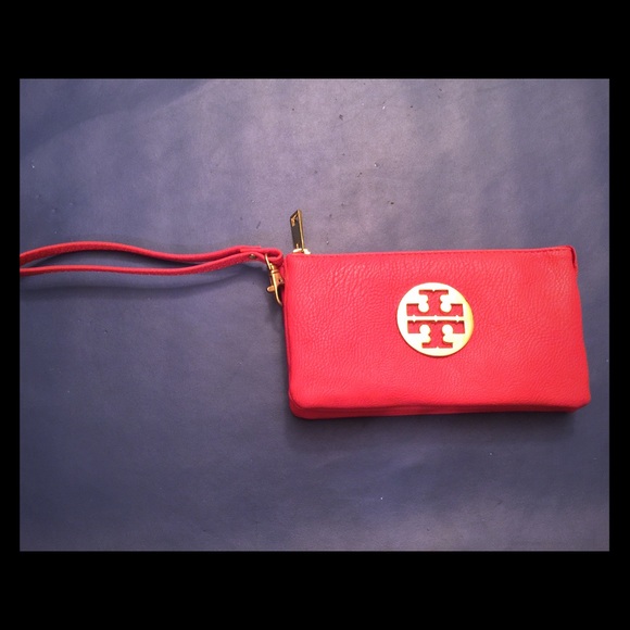 Pink faux Tory burch wristlet