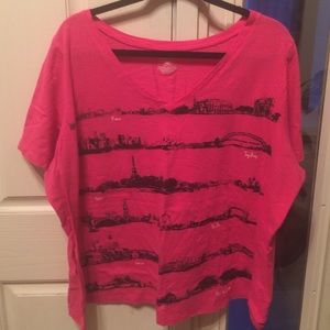 Hot pink v-neck tee.