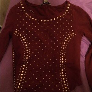 Maroon and gold dress.