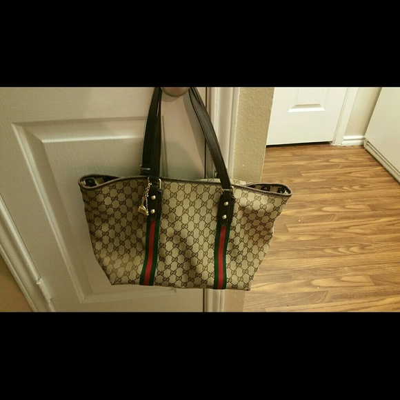 Gucci Accessories - Authentic gucci handbag SOLD