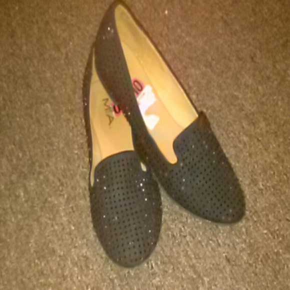 Black studded flats