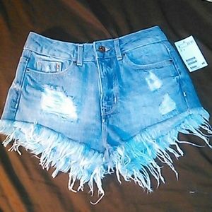 Highwaisted distressed denim shorts