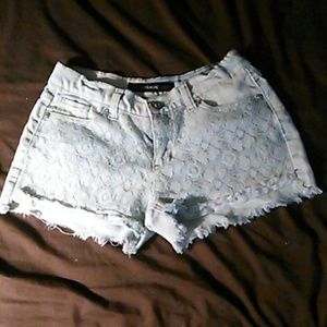 Lace denim shorts