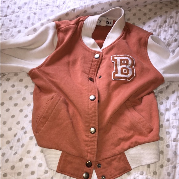 Orange jock jacket with off white sleeves