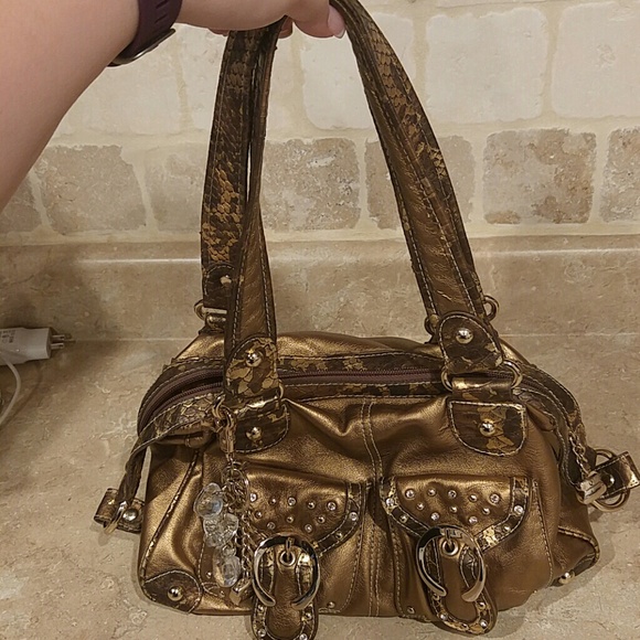 Kathy Van Zeeland bronze handbag