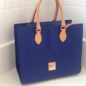 Brand New blue Dooney and Bourke bag.