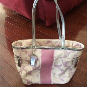 Pink and silver coach purse