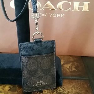 NWOT Coach chocolate brown signature ID lanyard